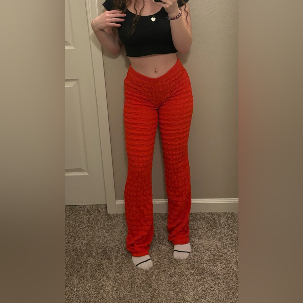 Bright red Urban Outfitters textured pants